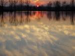 Soleil_couchant_sur_le_lac_des_sesquieres.jpg
